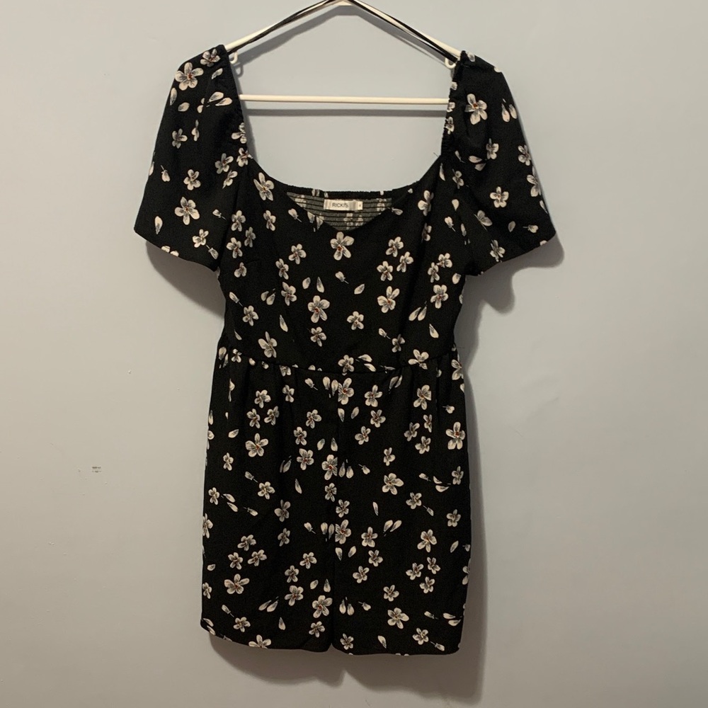 Ricky‘s black floral romper size 6